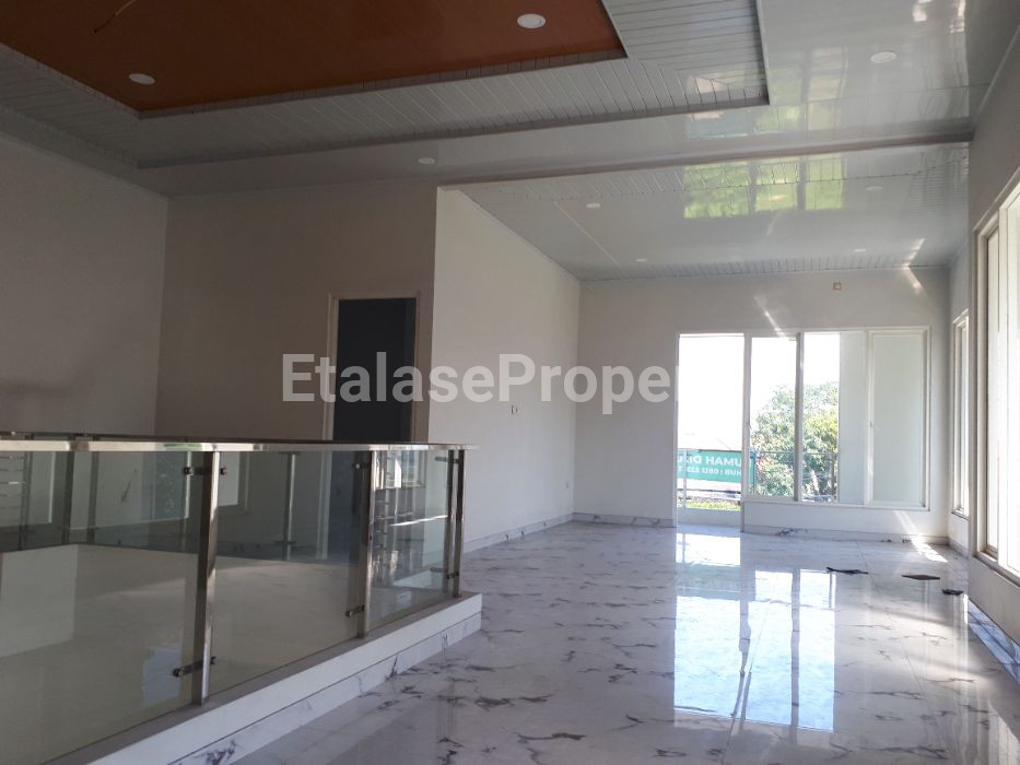 Foto properti JUAL RUMAH BARU 2 LANTAI, BERLOKASI DI JL. DHARMAHUSADA INDAH BARAT, SURABAYA TIMUR. 2