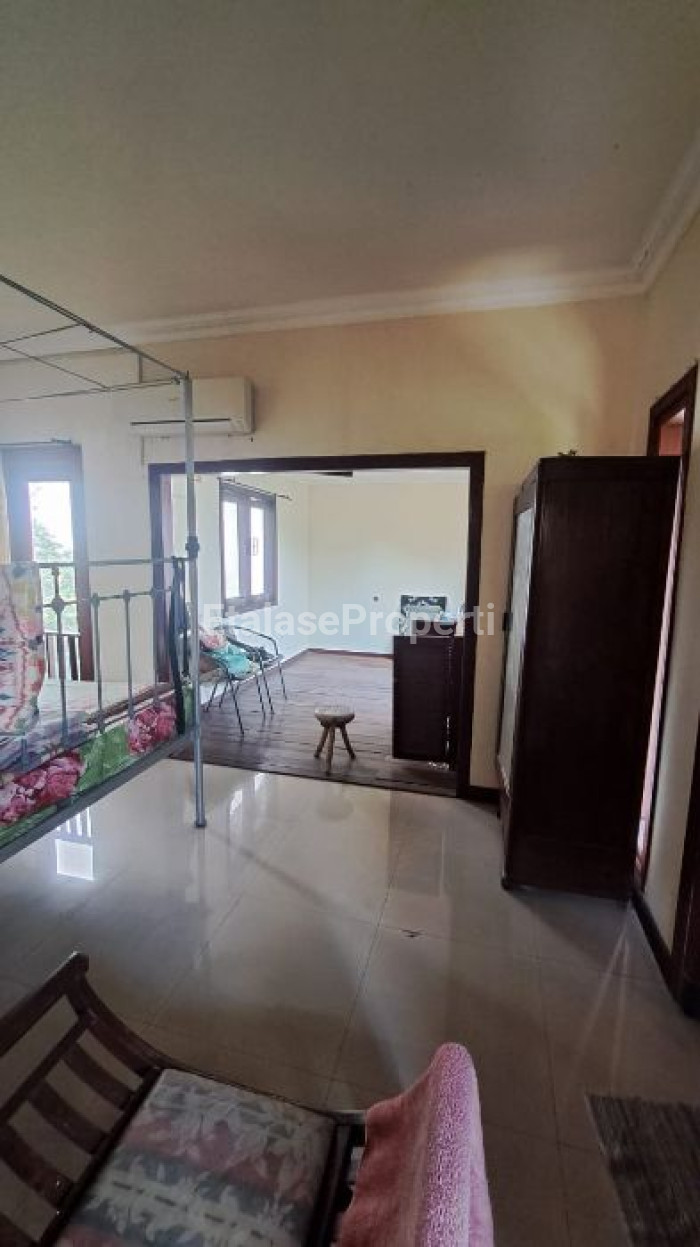 Foto properti JUAL Penjaringan Sari - Rumah Model Villa Bali 2
