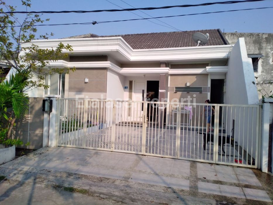 Foto properti Rumah Bagus Siap Huni Lokasi Strategis Di Taman Babatan Pantai Surabaya Timur 1