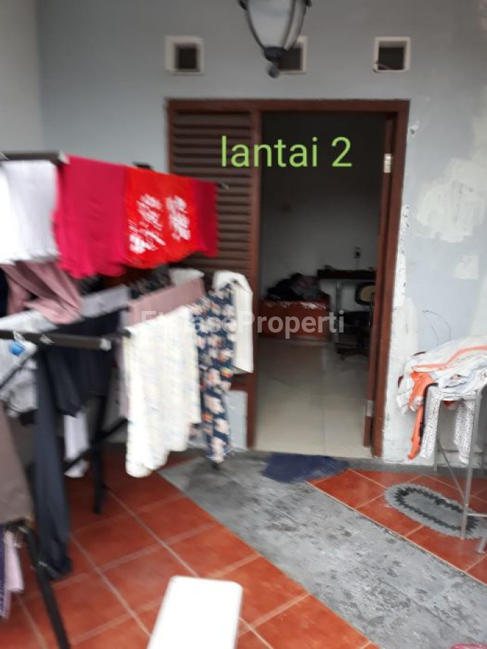 Foto properti DEKAT APARTEMEN! Dijual Rumah Purimas Ada Pohon Besar 6